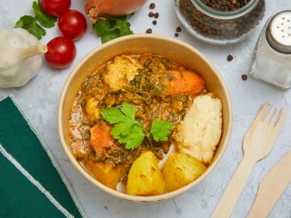 Mijotée de bœuf et fondue d'épinards aux graines de courge